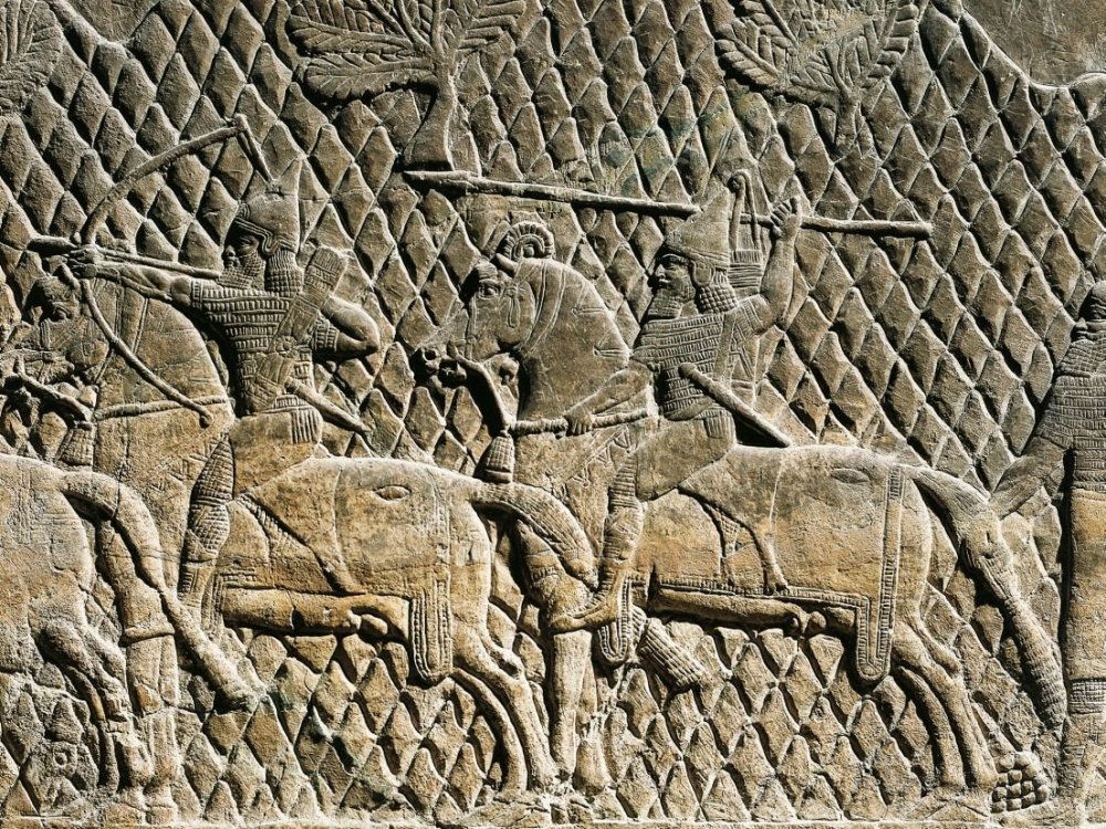 Assyrian relief depicting warriors on horses, 8th century B.C.E. From Ashurbanipal's palace at Nineveh.jpg