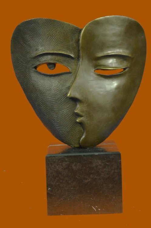 bronze-sculpture-depicting-faces-mask_1_9c4b4bca2225230718fc75d40f734b35.jpg