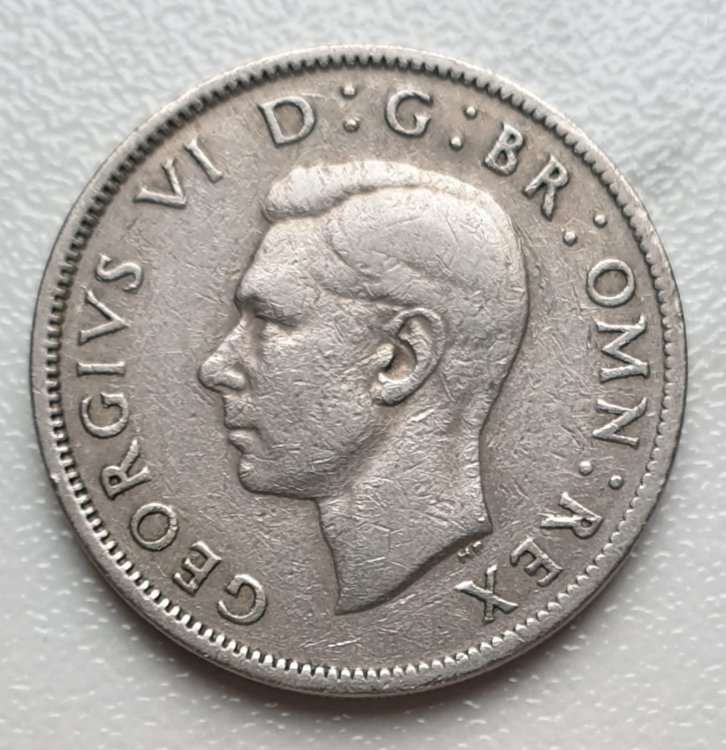 1443038933_TwoShillings1948(2).thumb.jpg.7f258bb18b2937a390de854dbd22b305.jpg