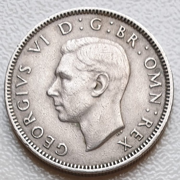 234047100_GranBretagna(1948)1Shilling(2).thumb.jpg.5ade7694f795bea4f78bf61305ea8023.jpg